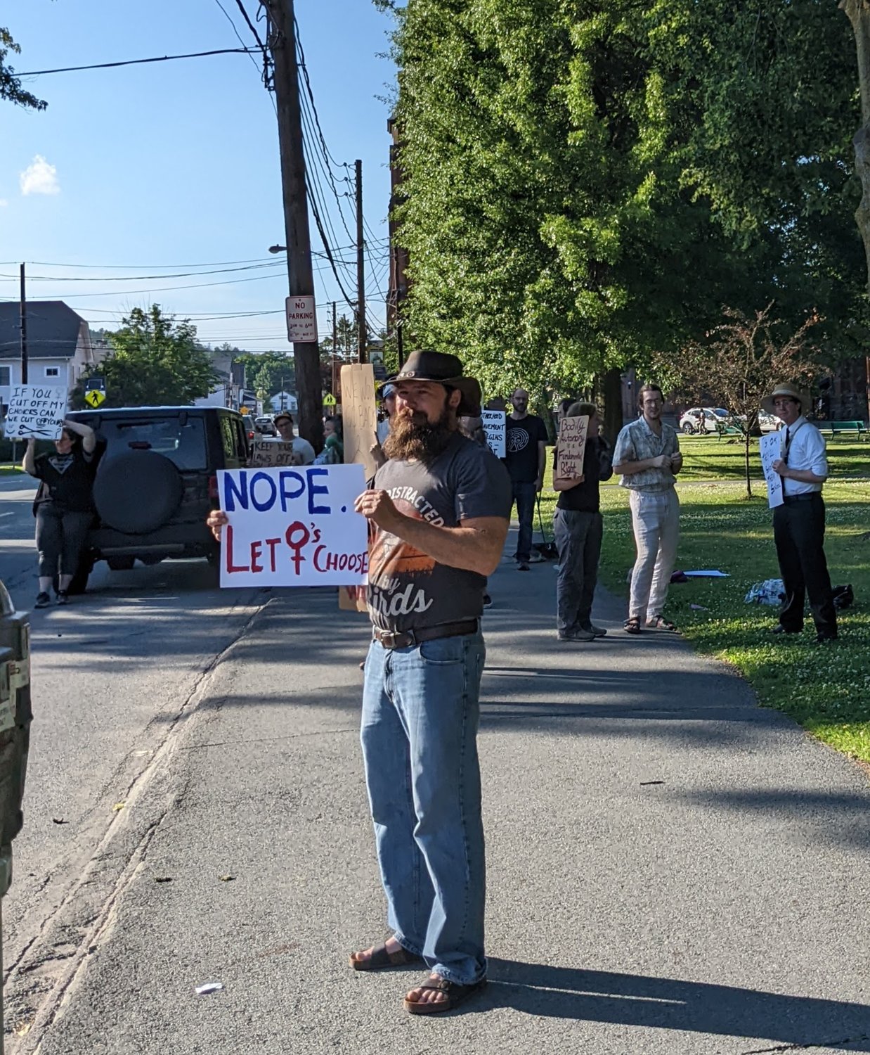 Over 50 people attended a Friday evening protest at Honesdale's Central Park. Families with young children to those in their 80s.